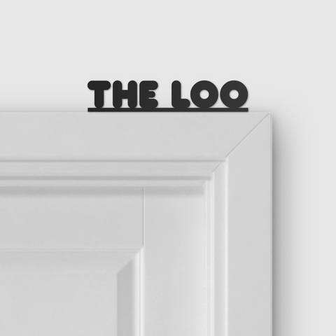 THE LOO door topper