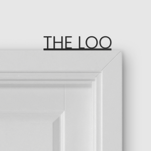THE LOO door topper