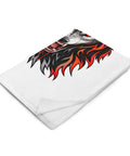Folded 30 × 40 in Fire Wolf throw blanket viewed at an angle with part of the front wolf illustration visible.