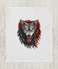 50 × 60 in Fire Wolf throw blanket laid on a pale wooden surface, showing the full centred wolf illustration.
