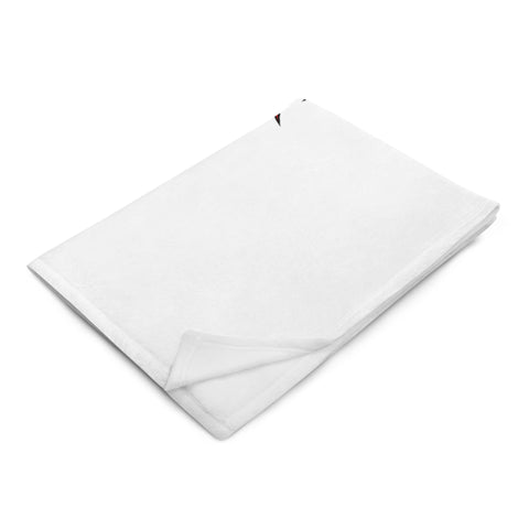Folded 50 × 60 in Fire Wolf throw blanket showing its plain white reverse side.