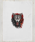 60 × 80 in Fire Wolf throw blanket laid on a pale wooden surface, showing the full centred wolf illustration.