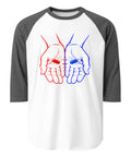 Front view of the Red or Blue Choice raglan shirt in White/Heather Charcoal, with red and blue hands holding matching capsules on the front.