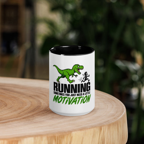 Front view of the 15 oz Dinosaur Motivation ceramic mug with black interior and handle on a round wooden table with softly blurred greenery, showing its single front design.