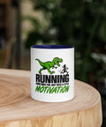 Front view of the 11 oz Dinosaur Motivation ceramic mug with dark blue interior and handle on a round wooden table with softly blurred greenery, showing its single front design.