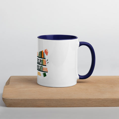 11 oz white No Shelf Control ceramic mug with dark blue interior, rim and handle, right view on a wooden board; book illustration and green lettering printed once on the front.