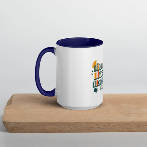 15 oz white No Shelf Control ceramic mug with dark blue interior, rim and handle, left view on a wooden board; book illustration and green lettering printed once on the front.