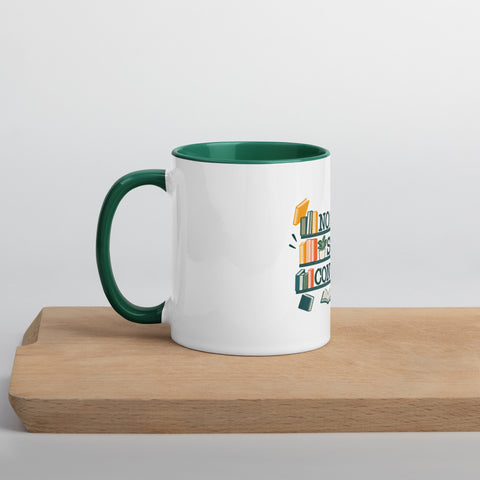 11 oz white No Shelf Control ceramic mug with dark green interior, rim and handle, left view on a wooden board; book illustration and green lettering printed once on the front.