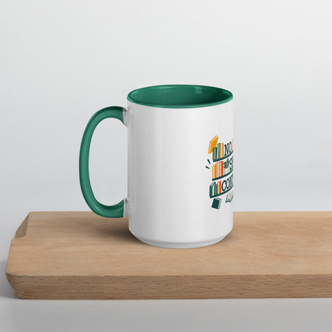 15 oz white No Shelf Control ceramic mug with dark green interior, rim and handle, left view on a wooden board; book illustration and green lettering printed once on the front.