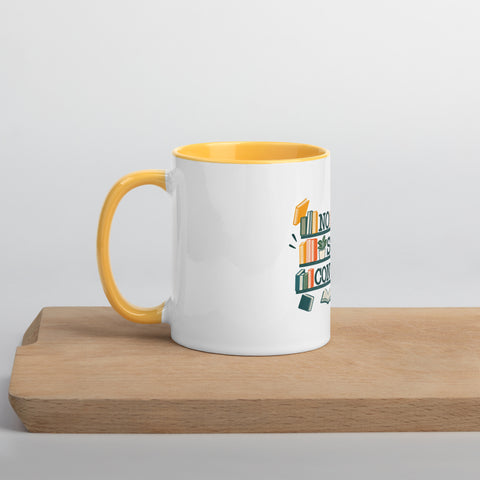 11 oz white No Shelf Control ceramic mug with golden yellow interior, rim and handle, left view on a wooden board; book illustration and green lettering printed once on the front.