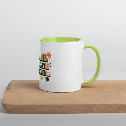 11 oz white No Shelf Control ceramic mug with green interior, rim and handle, right view on a wooden board; book illustration and green lettering printed once on the front.