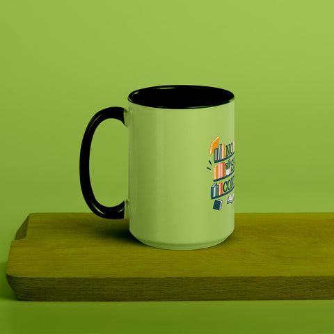 15 oz white No Shelf Control ceramic mug with green interior, rim and handle, left view on a wooden board; book illustration and green lettering printed once on the front.
