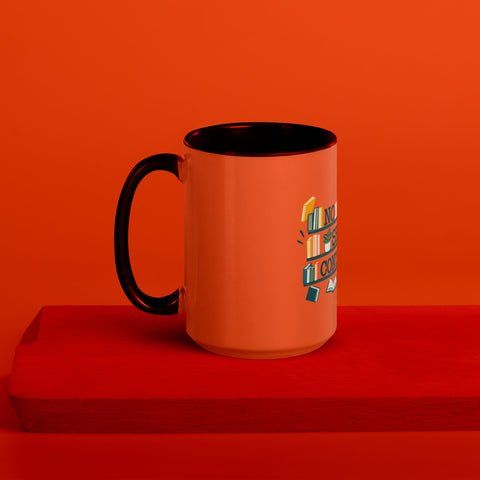 15 oz white No Shelf Control ceramic mug with orange interior, rim and handle, left view on a wooden board; book illustration and green lettering printed once on the front.