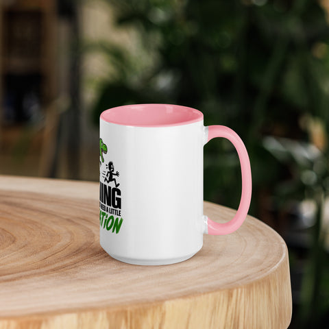 Right-side view of the 15 oz Dinosaur Motivation ceramic mug with pink interior and handle on a round wooden table with softly blurred greenery, showing its single front design.