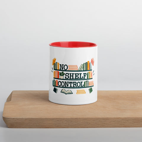 11 oz white No Shelf Control ceramic mug with red interior, rim and handle, front view on a wooden board; book illustration and green lettering printed once on the front.