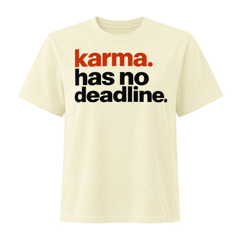 Karma Has No Deadline women's heavyweight garment-dyed tee in Buttermilk – front with rust-orange and black lettering, product view 1