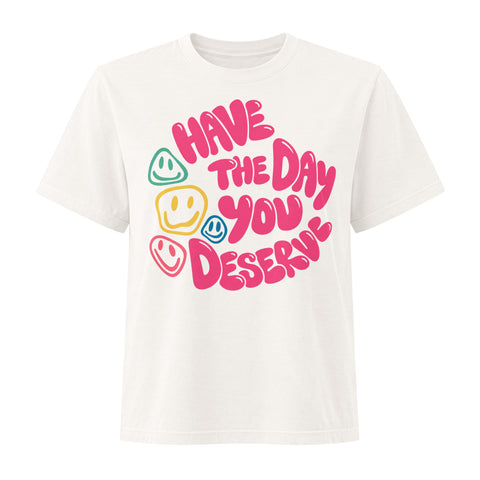 Vintage White women's heavyweight garment-dyed tee, front view with pink Have the Day You Deserve lettering and colourful smiley faces.