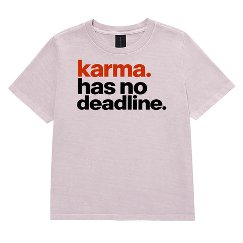 Karma Has No Deadline women's heavyweight garment-dyed tee in Washed Lavender – front with rust-orange and black lettering, product view 2