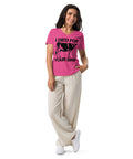 Model wearing a Berry women’s relaxed V-neck tee with one large black cow stencil and I Died for Your Sins lettering printed high on the front; plain sleeves and back.
