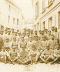 World War I French Soldiers Group posing in a street of a French town Photo Postcard