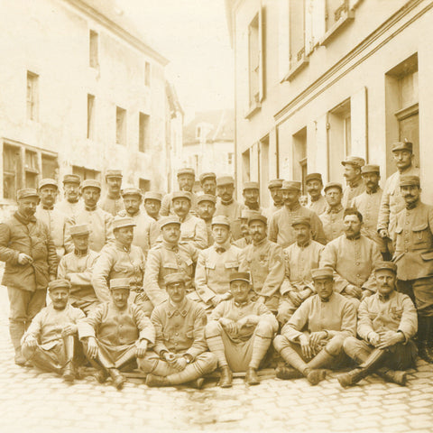 World War I French Soldiers Group posing in a street of a French town Photo Postcard