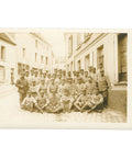 World War I French Soldiers Group posing in a street of a French town Photo Postcard