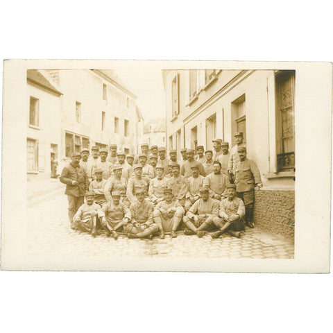 World War I French Soldiers Group posing in a street of a French town Photo Postcard