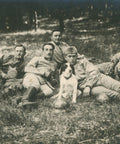 World War I French Soldiers Resting with Dog Postcard