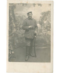 World War I German Soldier holds a sword Photo Postcard