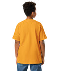 Youth model wearing a Gold One Cat Away youth classic tee, showing the plain back.