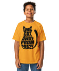 Youth model wearing a Gold One Cat Away youth classic tee, showing the black cat-shaped One Cat Away From Crazy print on the front.
