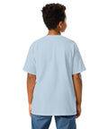 Youth model wearing a Light Blue One Cat Away youth classic tee, showing the plain back.