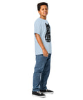 Youth model wearing a Light Blue One Cat Away youth classic tee, showing the black cat-shaped One Cat Away From Crazy print on the front.