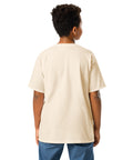 Youth model wearing a Natural One Cat Away youth classic tee, showing the plain back.