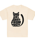 Product view of a Natural One Cat Away youth classic tee, showing the black cat-shaped One Cat Away From Crazy print on the front.