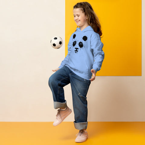 Carolina Blue youth hoodie worn by a child playing with a football, with the original black ink-splatter panda face on the front.