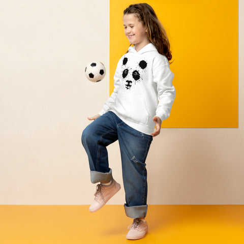 White youth hoodie worn by a child playing with a football, with the original black ink-splatter panda face on the front.