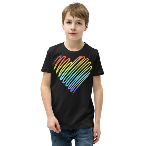 Young model wearing a black Rainbow Heart youth T-shirt, showing one large colourful heart positioned high on the front.